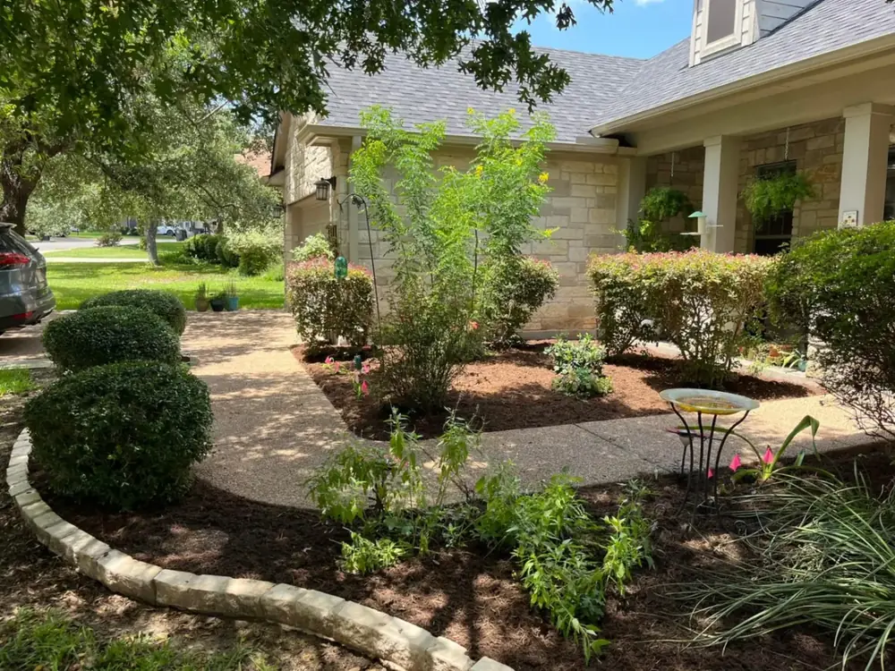 Front beds with fresh mulch and trimmed shrubs